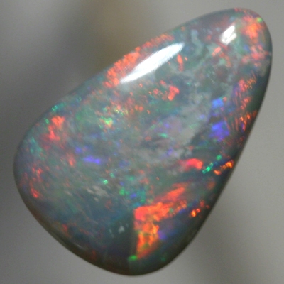 SOLID SEMI BLACK OPAL Sparkles of bright red with green and blue in between